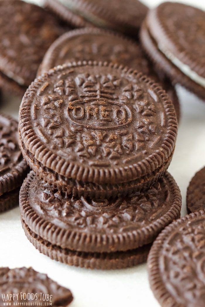 Close-up of stacked Oreo cookies before making the crumb layer for Halloween dessert shooters.
