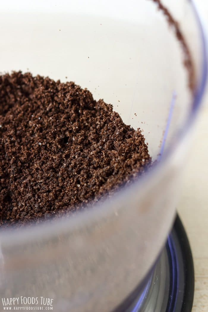 Ground Oreo crumbs in a food processor ready to use as the “soil” layer.