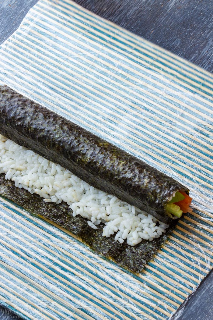 How to make Homemade Sushi Step 4 - Half rolled sushi roll