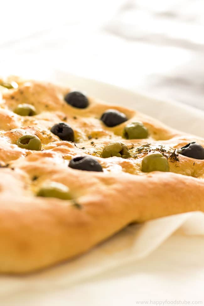 Focaccia Bread with Olives & Thyme Recipe - easy flat oven-baked Italian bread recipe, homemade delicious bread recipe, Italian food, baking | happyfoodstube.com