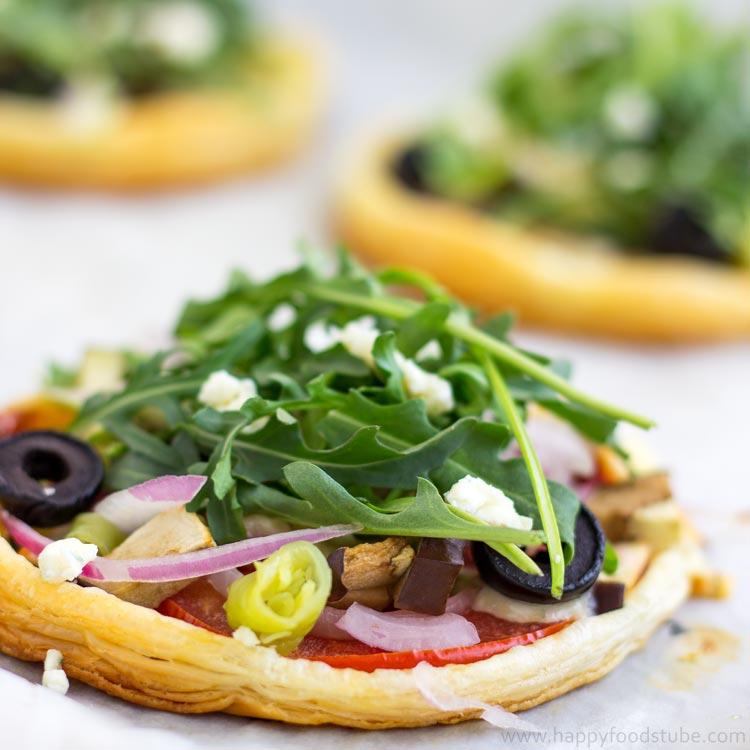Mini Vegetarian Puff Pastry Pizzas Closeup - Quick and easy recipe, not a traditional pizza, healthy toppings, mouth-watering snack, party food | happyfoodstube.com