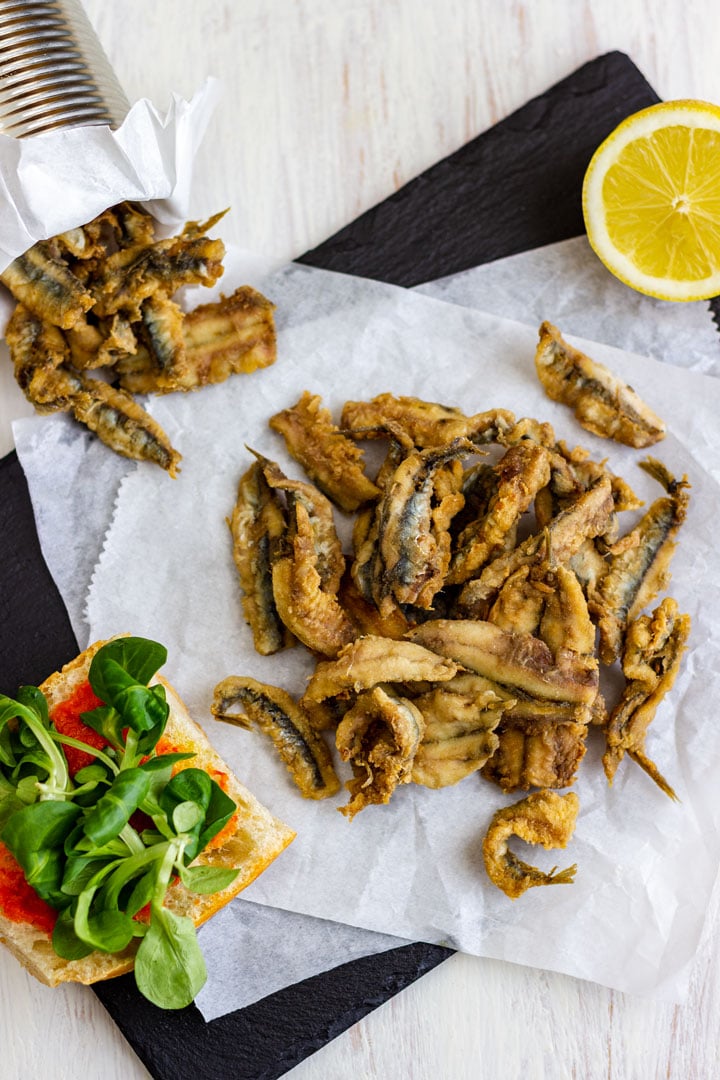 Deep fried anchovies with wedge of lemon