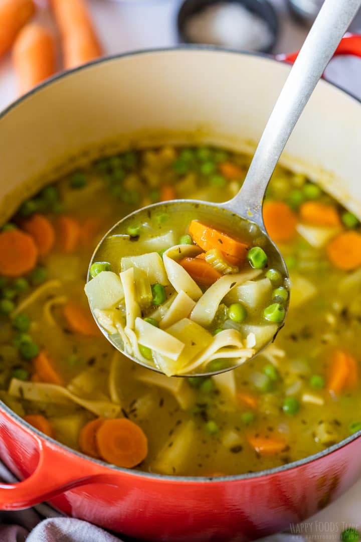 Spring vegetable soup in ladle