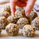 Walnut truffles (chocolate balls with nuts) coated in chopped walnuts.