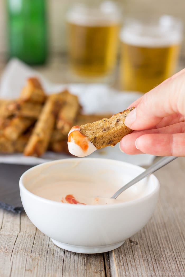 Dry-Fried Garlic Sourdough Soldiers (Küüslauguleivad) - An incredible snack recipe that goes hand in hand with beer. Crispy stripes of sourdough bread dry-fried and coated in olive oil + garlic | happyfoodstube.com