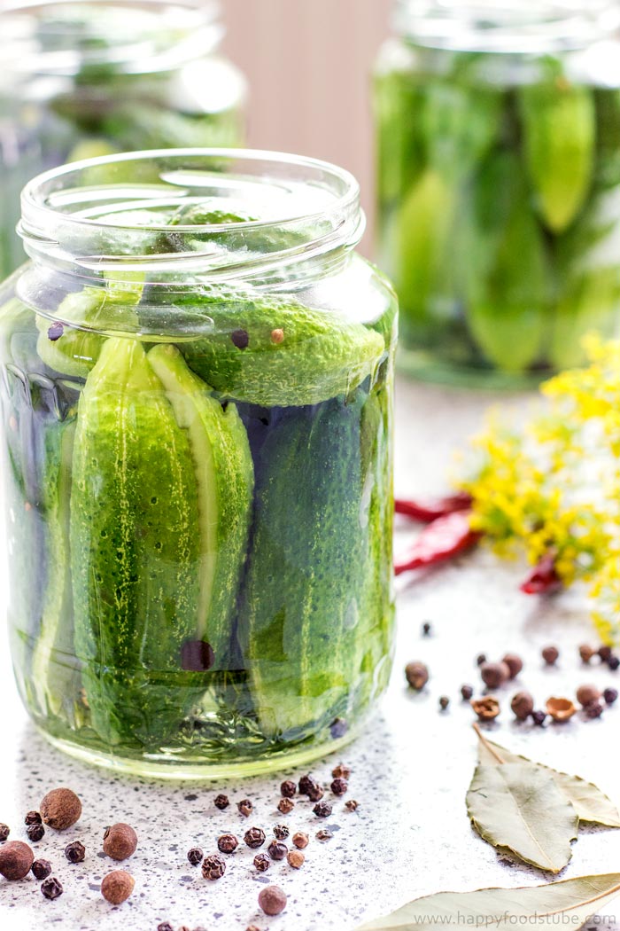 Let’s pickle some cucumbers! This spicy sweet and sour dill pickles recipe is our favorite and never disappoints! | happyfoodstube.com