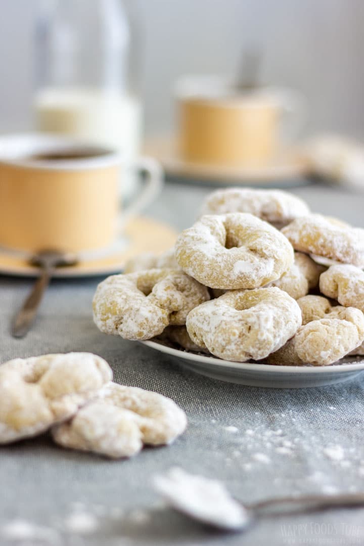 Traditional Spanish white wine cookies with cup of coffee on the table