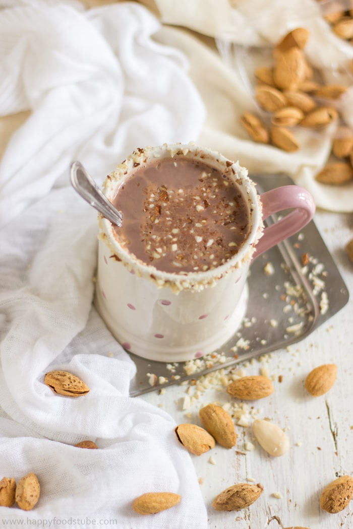 Homemade vegan hot cocoa in the mug with spoon