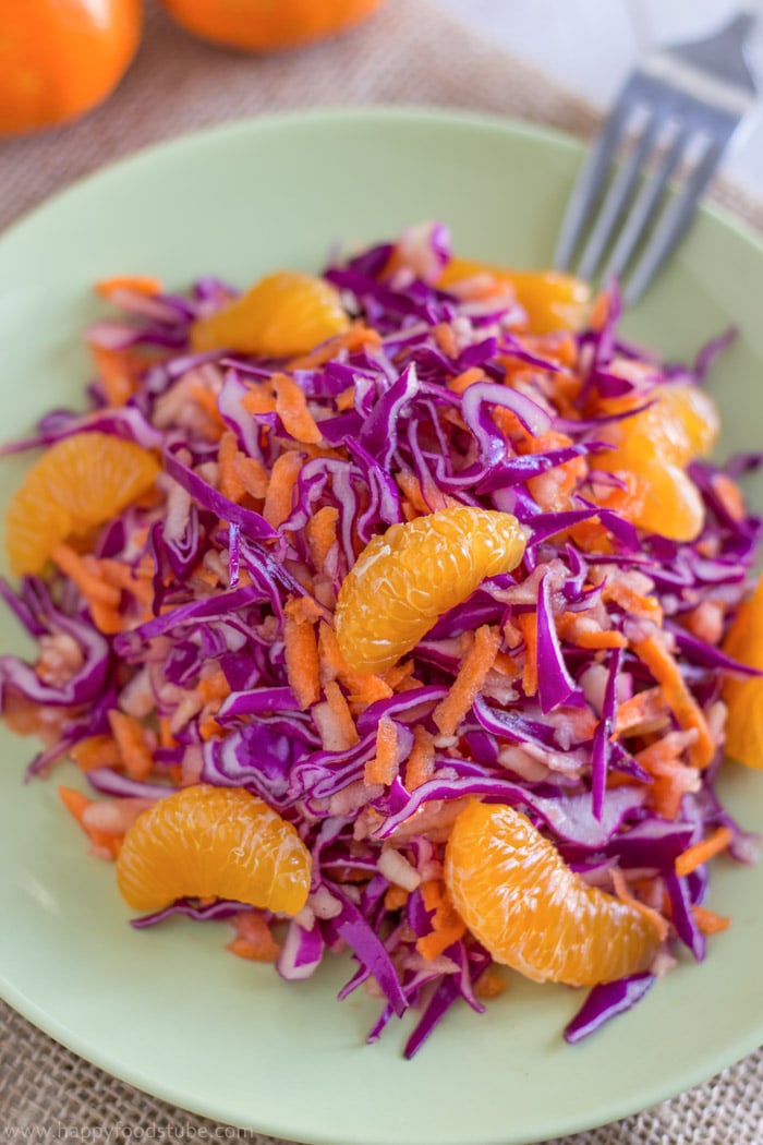 Plate of red cabbage salad with fork in.