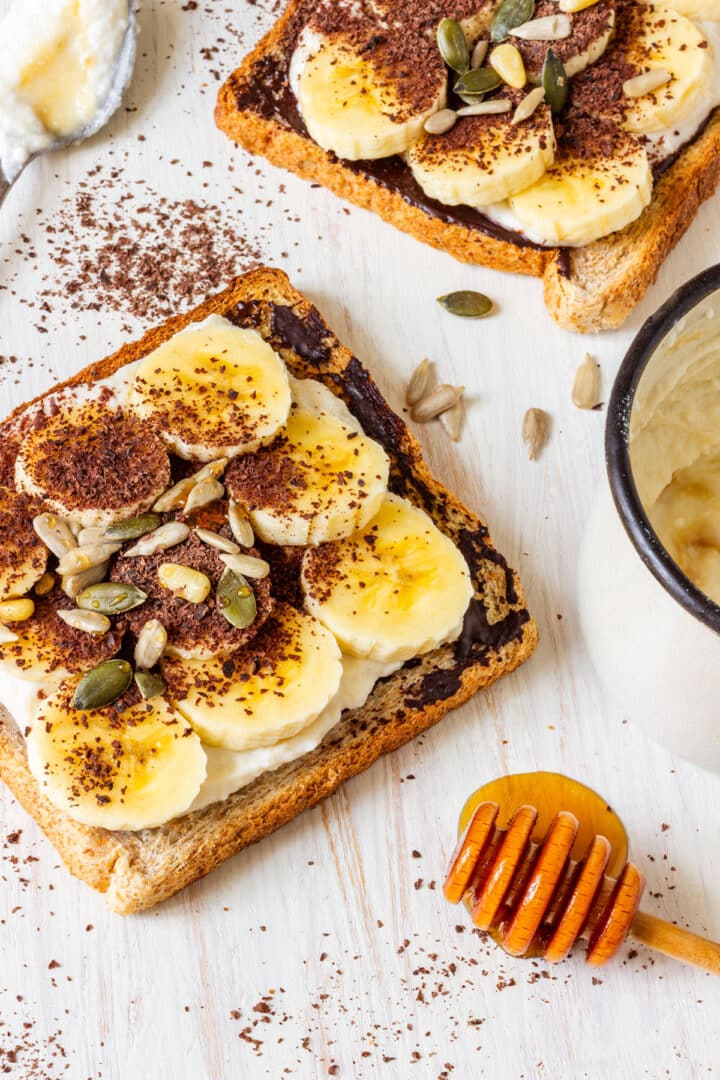 Banana toast with ricotta, chocolate and seeds.