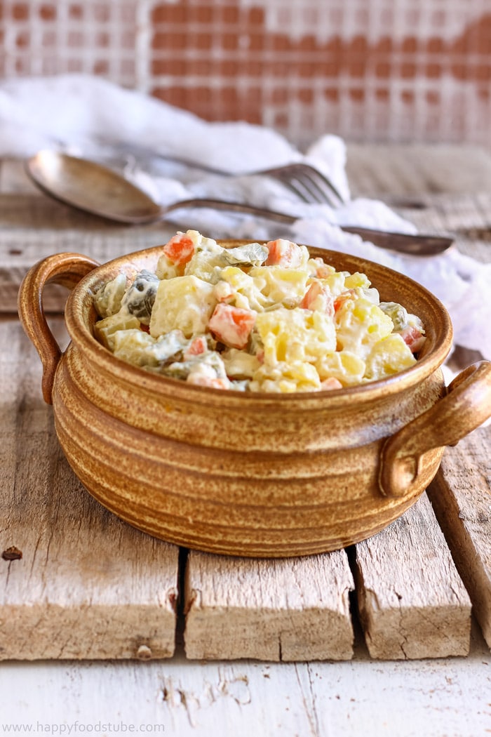Lighter Dill Pickle Potato Salad Picture Bowl of homemade dill pickle potato salad on a rustic table.