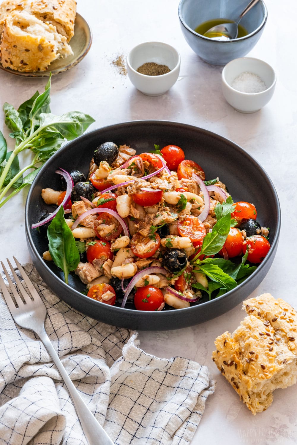 Mediterranean style tuna and white bean salad with fresh ingredients.
