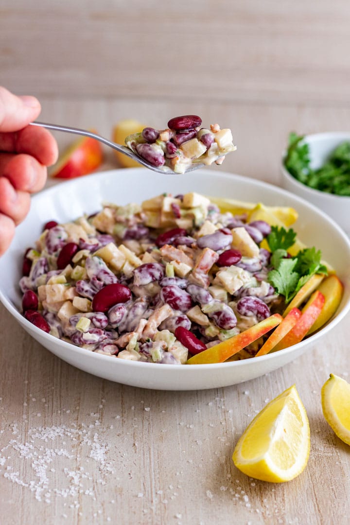 Spooning kidney bean salad