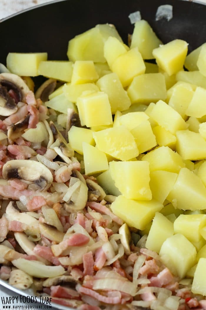Boiled diced potatoes added to bacon, mushroom and onion mixture.