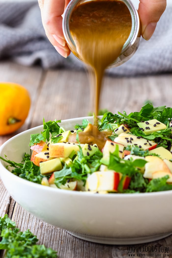 Fresh Kale Salad Pouring Dressing Picture