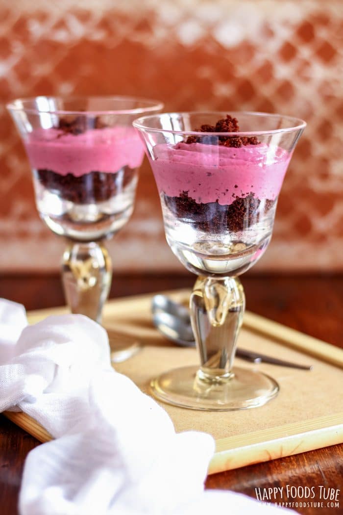 Two Chocolate Raspberry Parfaits on the table
