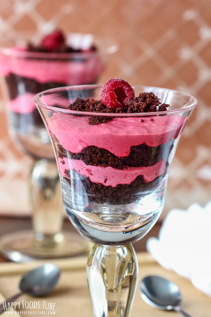 Layered Chocolate Raspberry Parfait topped with raspberries