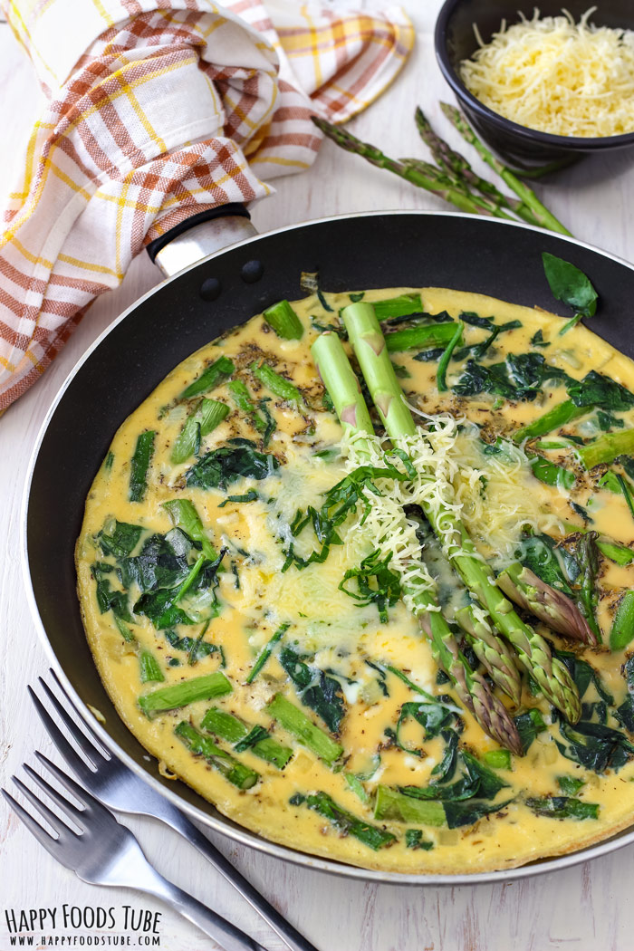 Spinach and Asparagus Frittata on the pan for breakfast