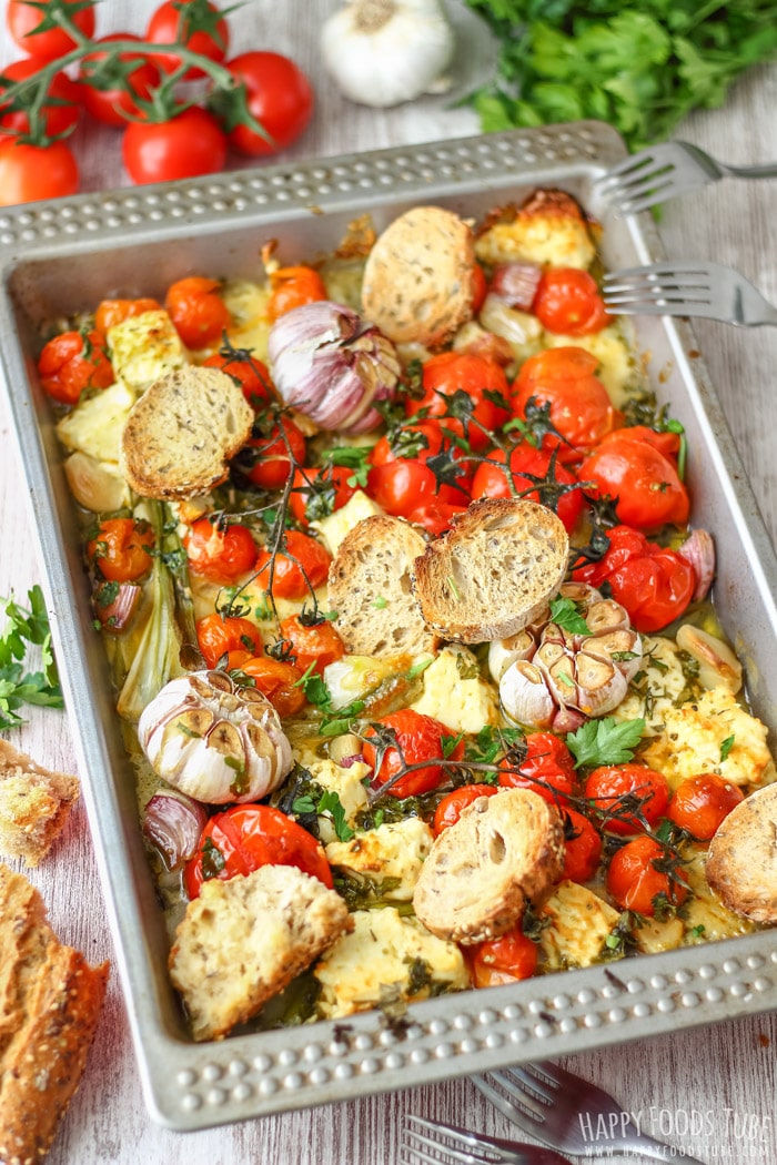 Oven Roasted Cherry Tomatoes with Feta and Mozzarella on the sheet pan