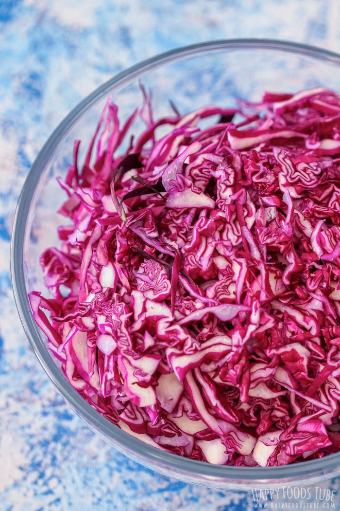 Shredded red cabbage in the glass bowl