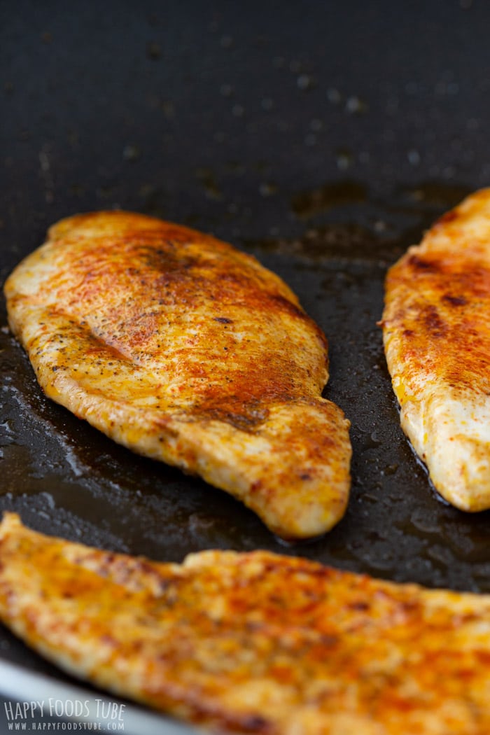 Cooking chicken breasts on the skillet for Chicken Bacon Salad