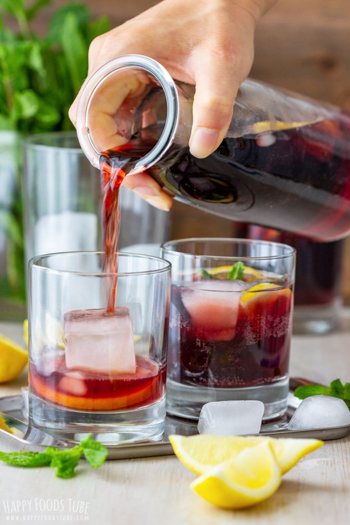 Pouring Spanish Calimocho to the glass