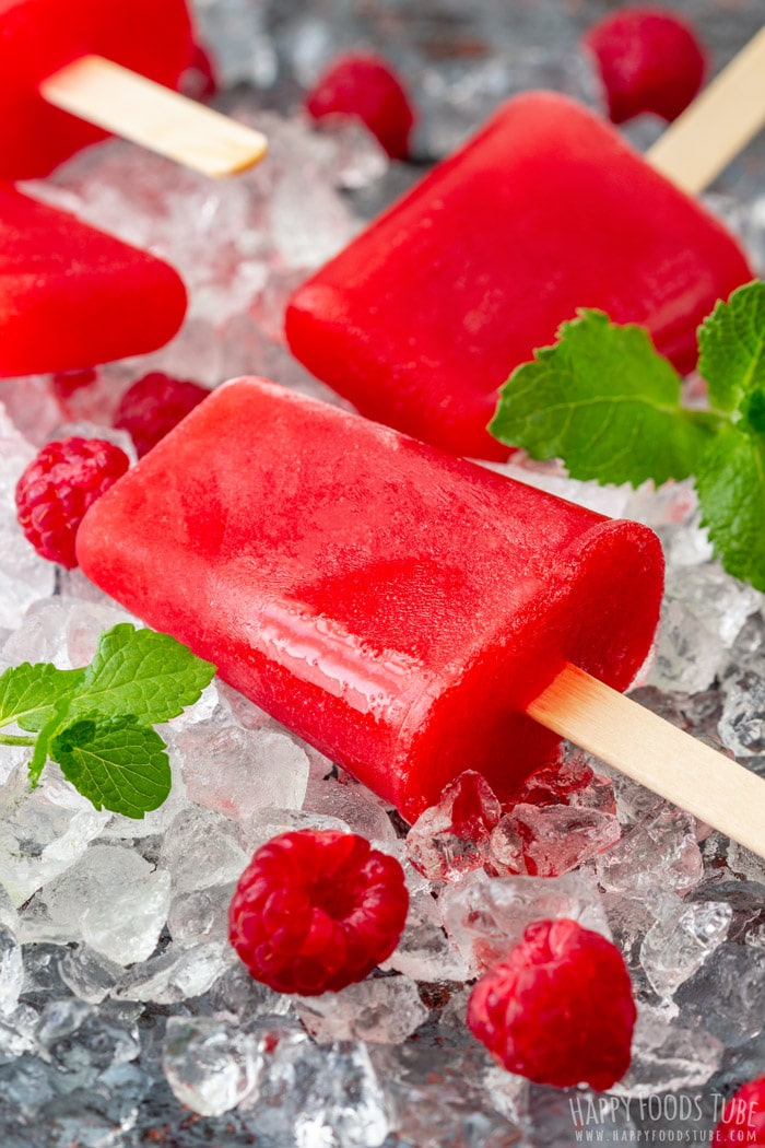 Homemade Raspberry Mint Ice Pops on the crushed ice