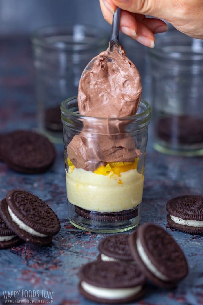 Adding Chocolate Layer to Chocolate Mango Cheesecake Parfait