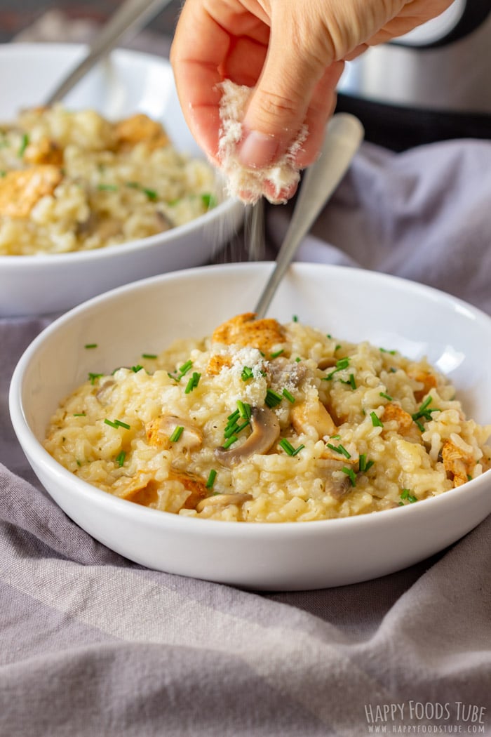 Instant Pot Chicken Risotto topping with parmesan cheese