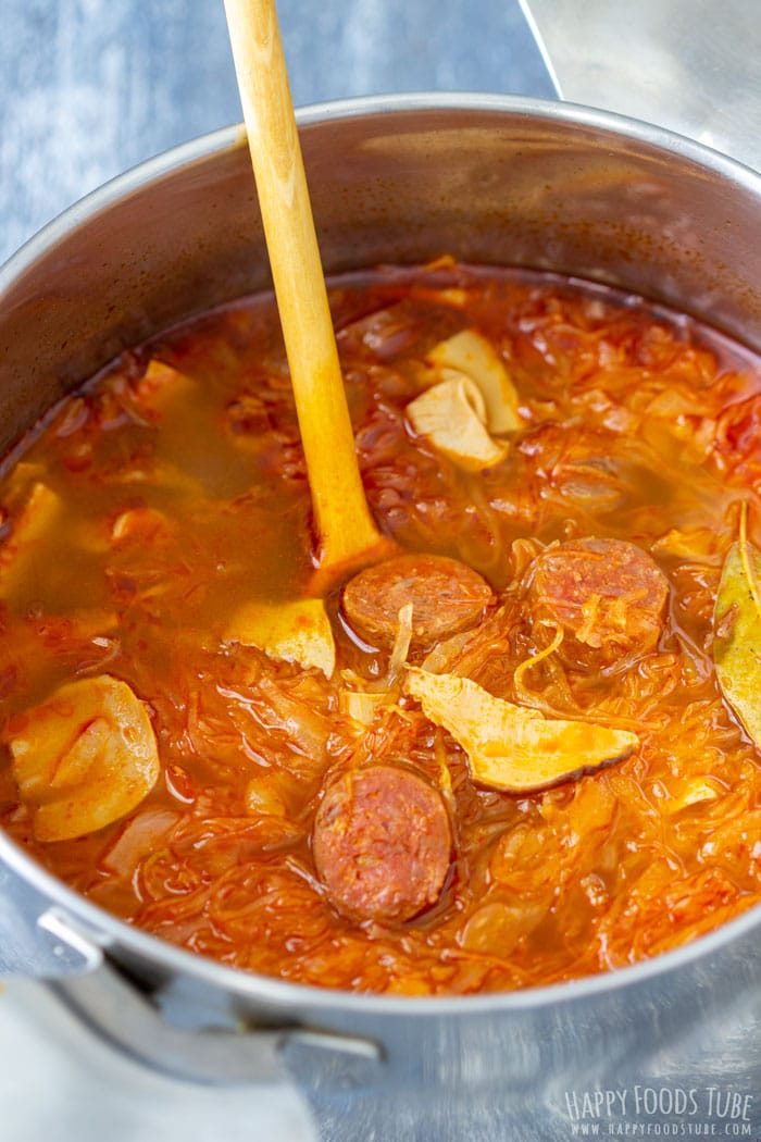 Freshly Made Sauerkraut Soup with Chorizo Sausages in the Pot