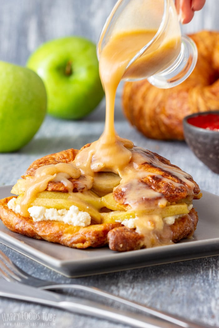 Pouring Sauce Over the Croissant French Toast