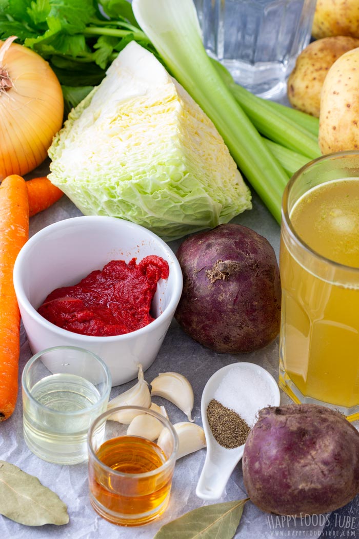Fresh ingredients for borscht - beets, carrots, potatoes, celery, onion, garlic
