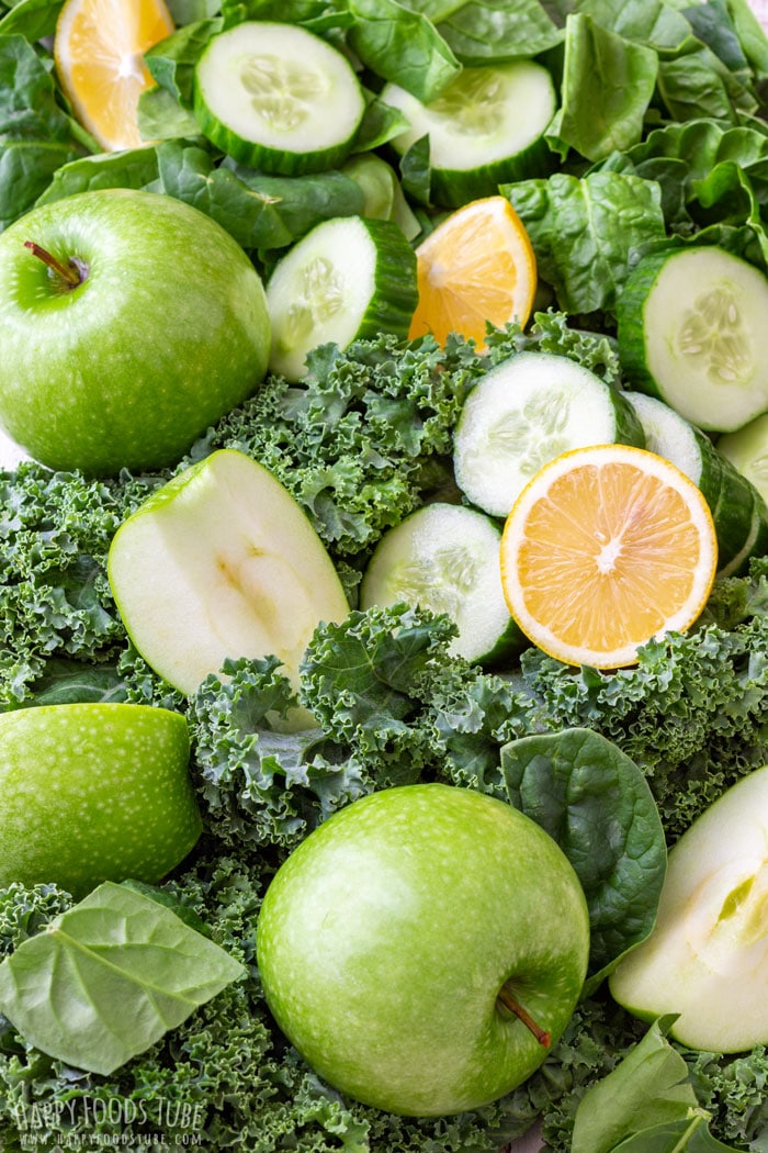 Ingredients of green juice - green apples, cucumber, kale and spinach.