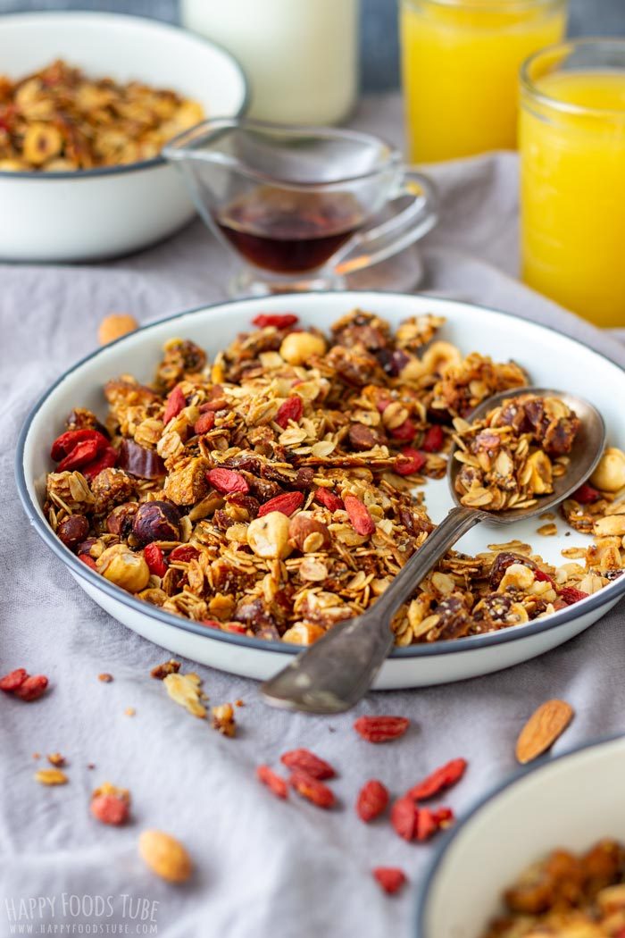 Homemade granola in a bowl with nuts, seeds and dried fruit.