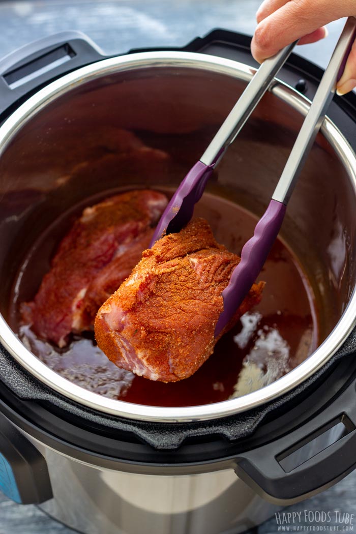 Process Shots of Instant Pot Pulled Pork Step 4 Placing the Meat to Instant Pot