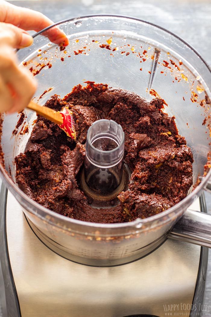 Thick chocolate brownie mixture in the food processor after blending.