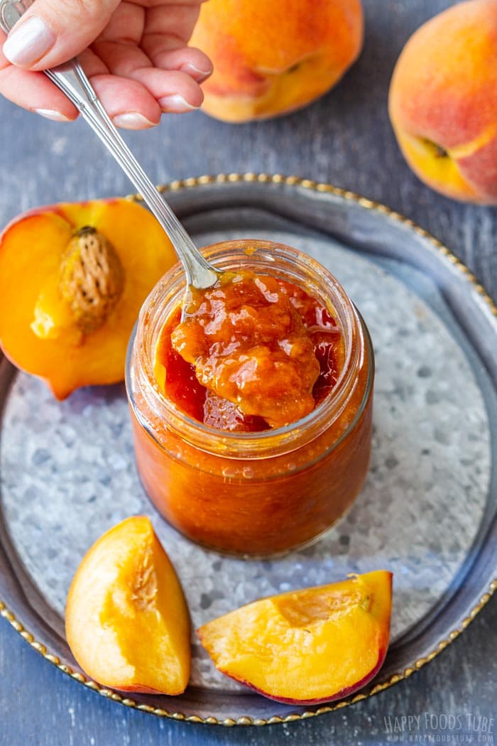 Spooning Homemade Instant Pot Peach Jam