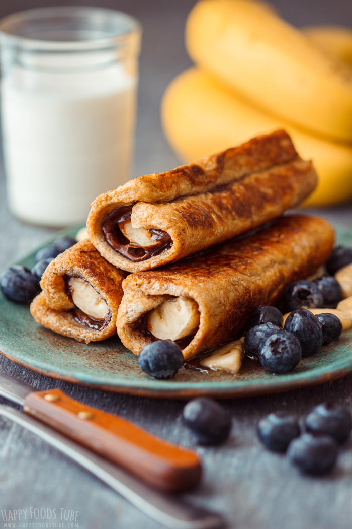 Nutella Banana French Toast Roll Ups with Blueberries and Honey Drizzle