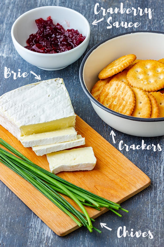Four ingredients of cranberry brie bites on the table.