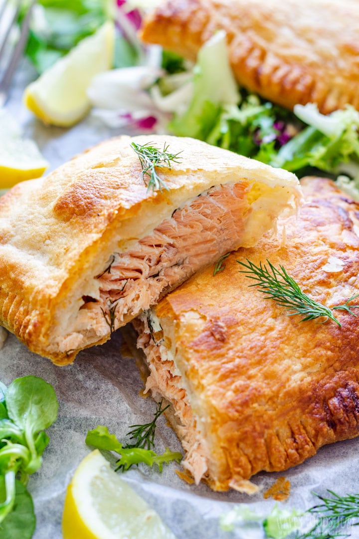 Freshly Made Salmon En Croute with Salad and Lemon Wedge