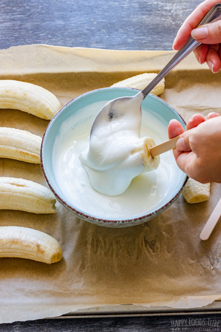 How to make Frozen Banana Pops Step 2 (Covering Bananas with Yogurt)