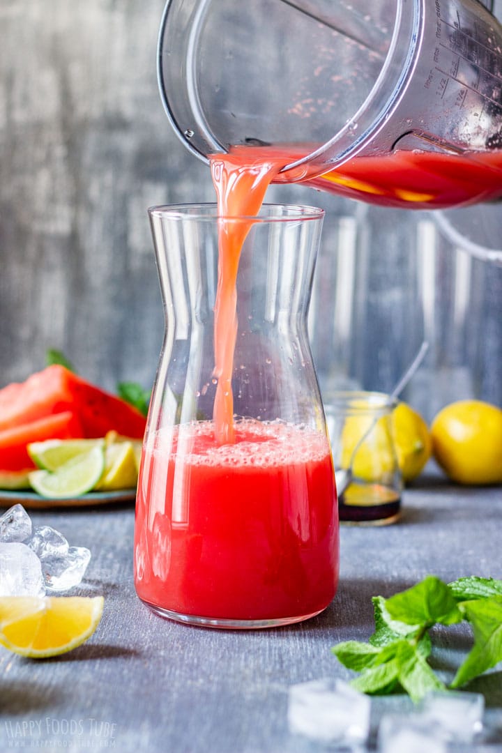 Pouring Watermelon Agua Fresca to the Jug for Chilling