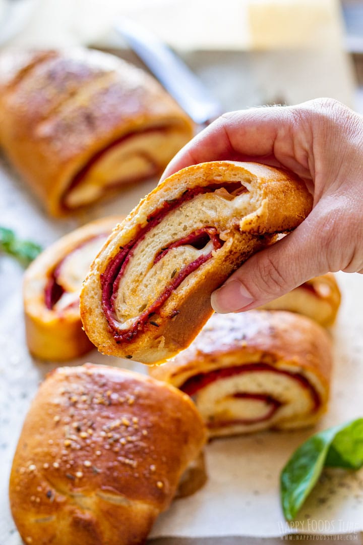 Holding slice of Stromboli