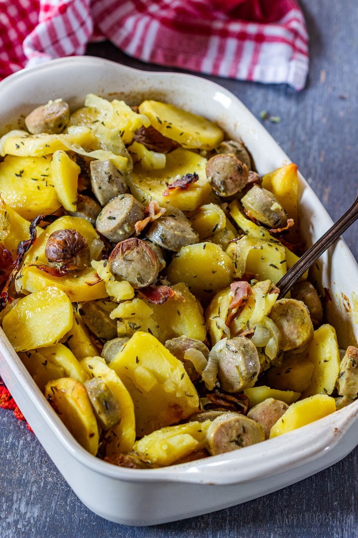 Bratwurst casserole with potatoes, onion, bacon and bratwurst