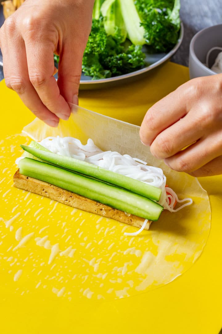 Wrapping fresh spring rolls with rice paper step 1