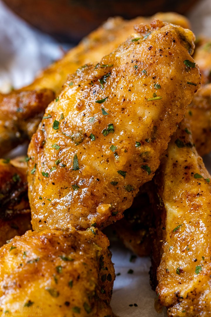 Close-up of chicken wings with garlic and parmesan