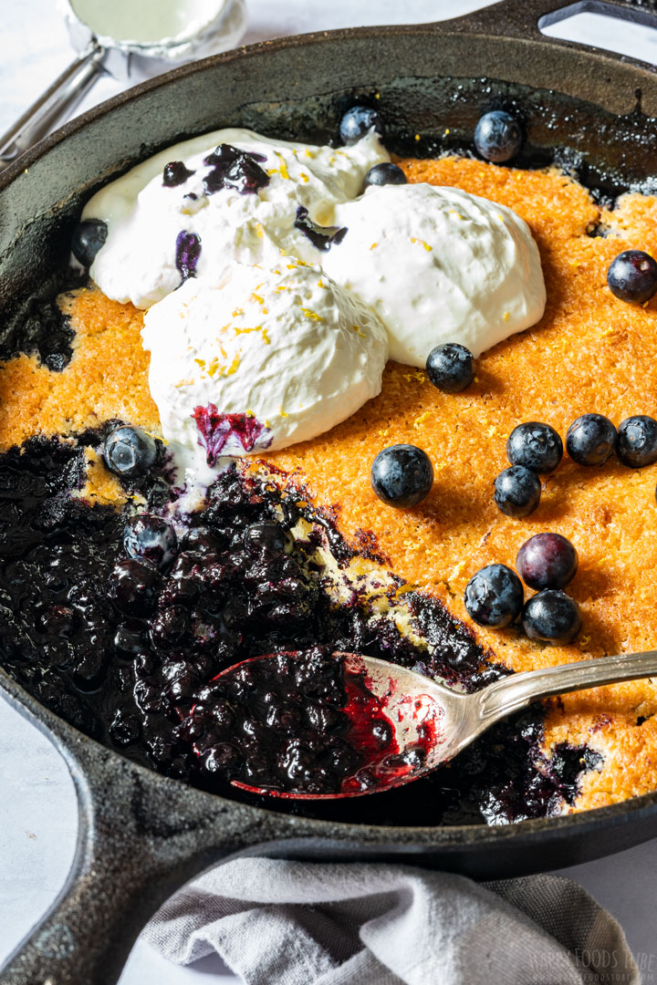 Skillet blueberry cobbler with spoon