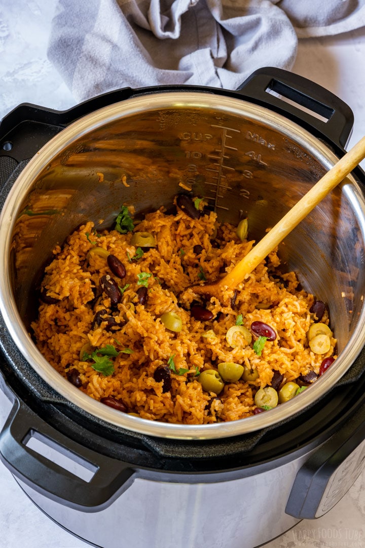 Instant pot Mexican rice and beans with wooden spoon
