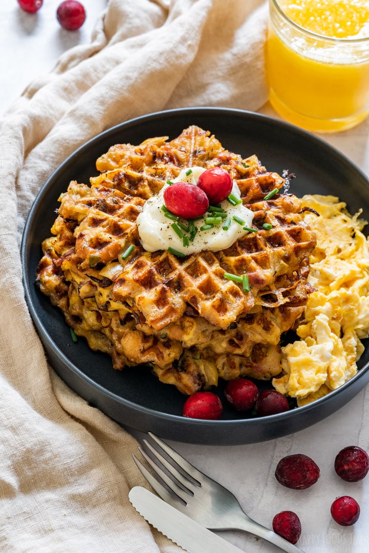 A plate of savory waffles made with Thanksgiving leftover stuffing.