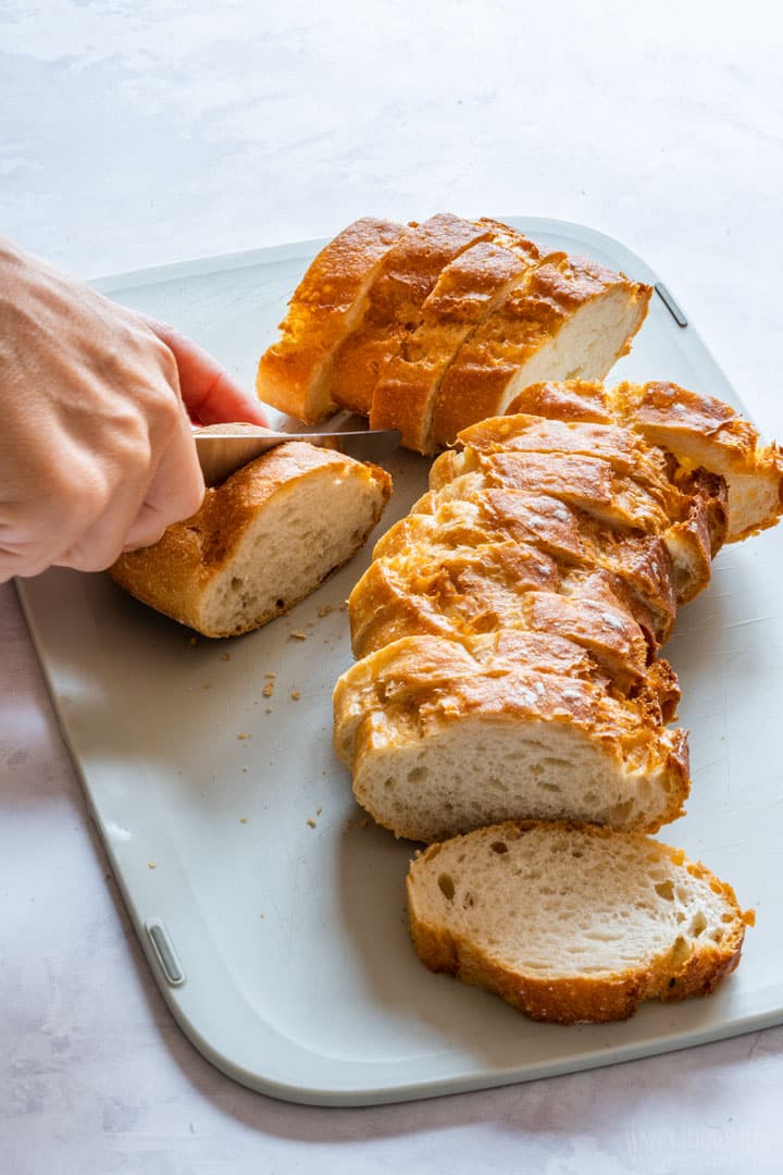 Slicing bread for croutons.